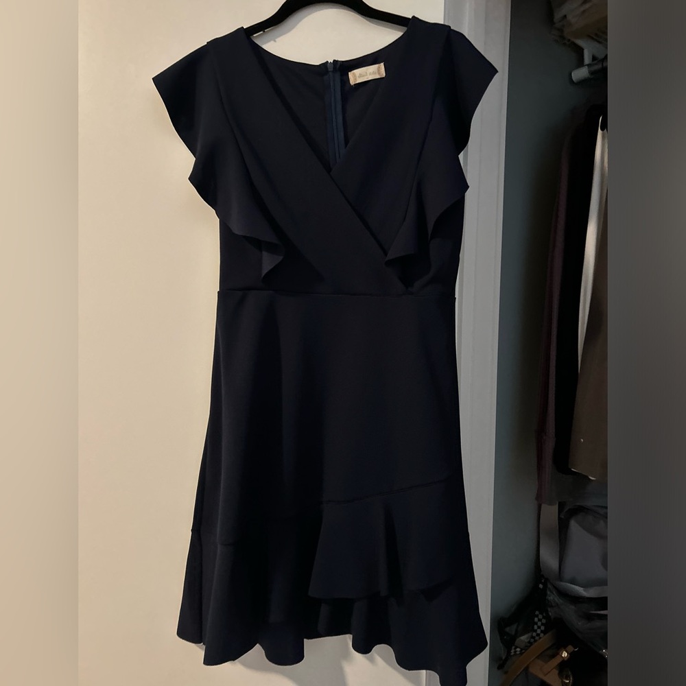Navy blue knee length dress. V neck